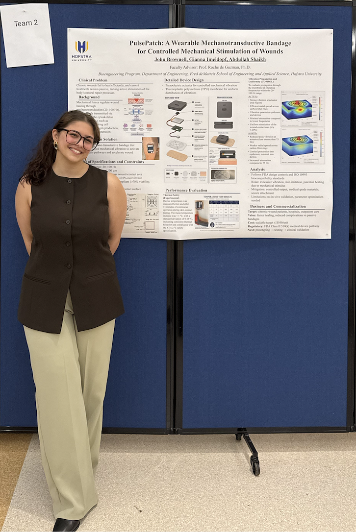 Gianna standing beside the PulsePatch senior design poster